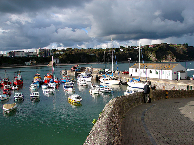 The pier in Tenby harbour, with Croft Court and North Cliff in the background